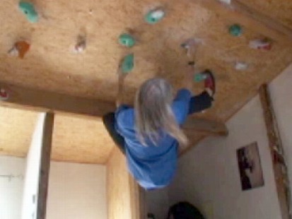 VIDEO: Building climber Alain Robert hangs from ceiling at home to stay in super shape.